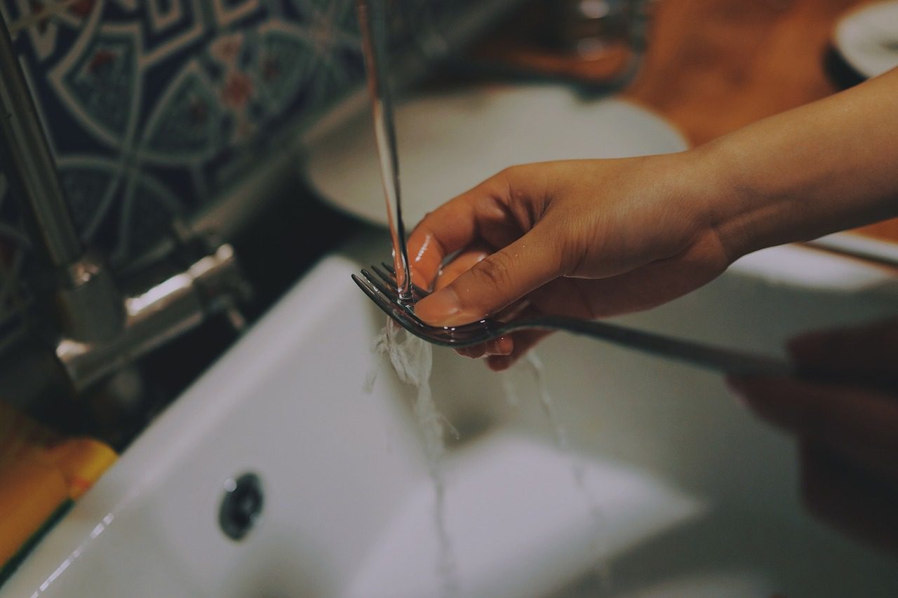 sink, fork, hand