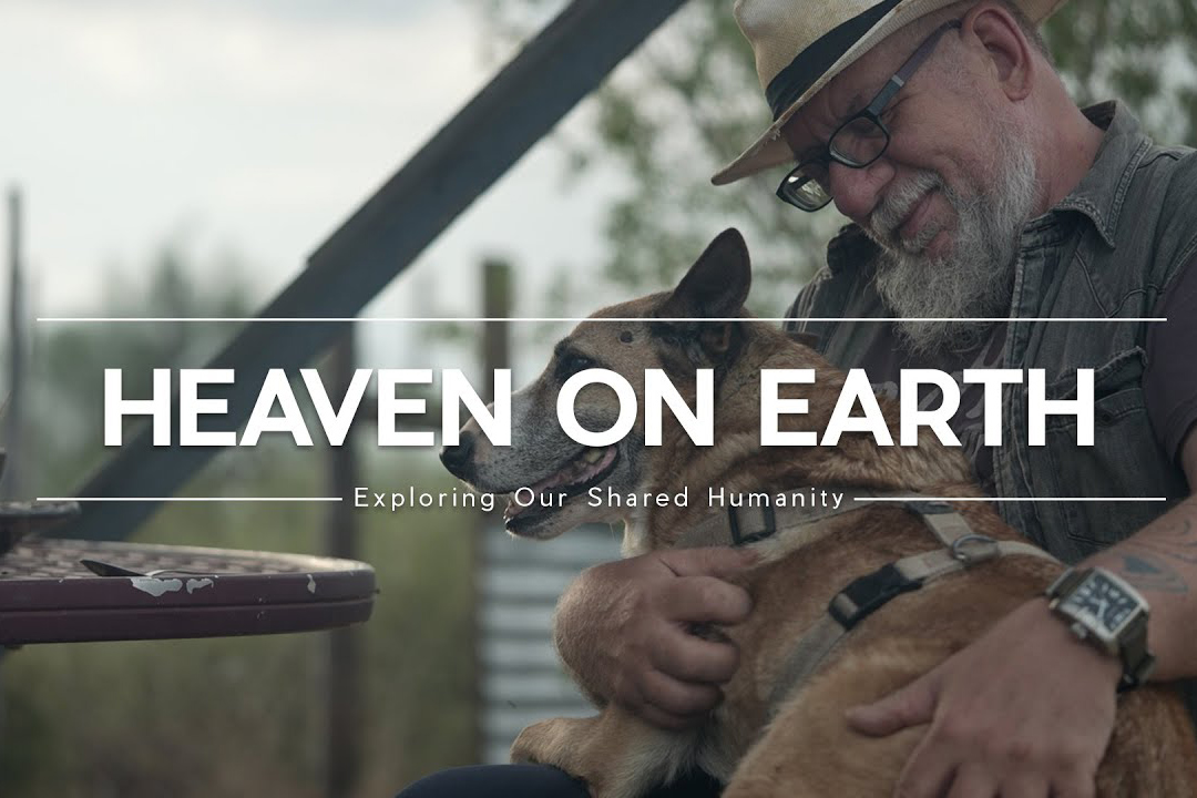 An older man hugging a dog with text that reads, "Heaven on Earth"