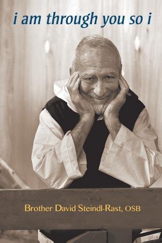 Br. David Steindl-Rast smiling with elbows on the table, hands cupping his cheeks. Cover of his book "i am through you so i"