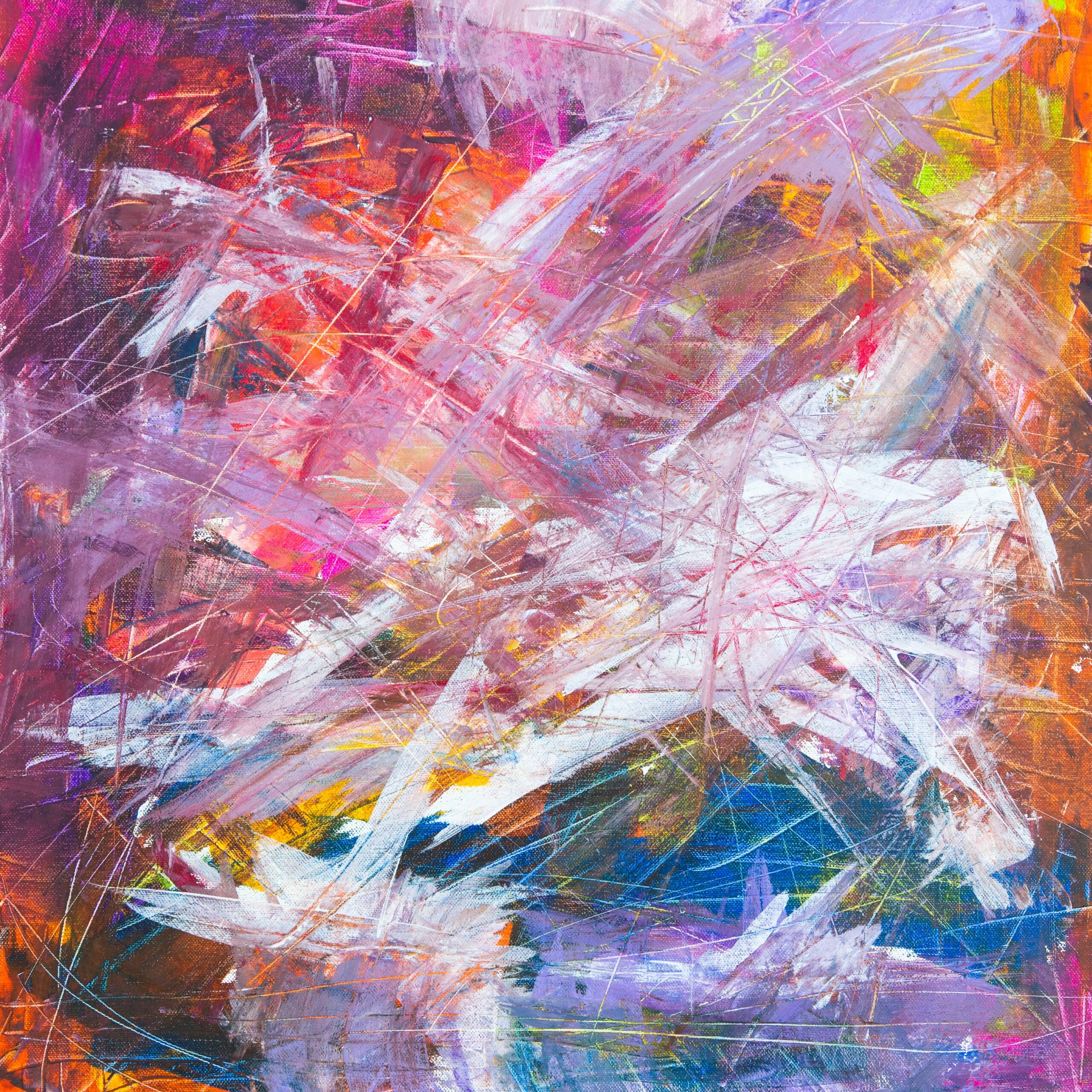 Multicolored paint splatter in hues of pink, orange, blue, purple, and white