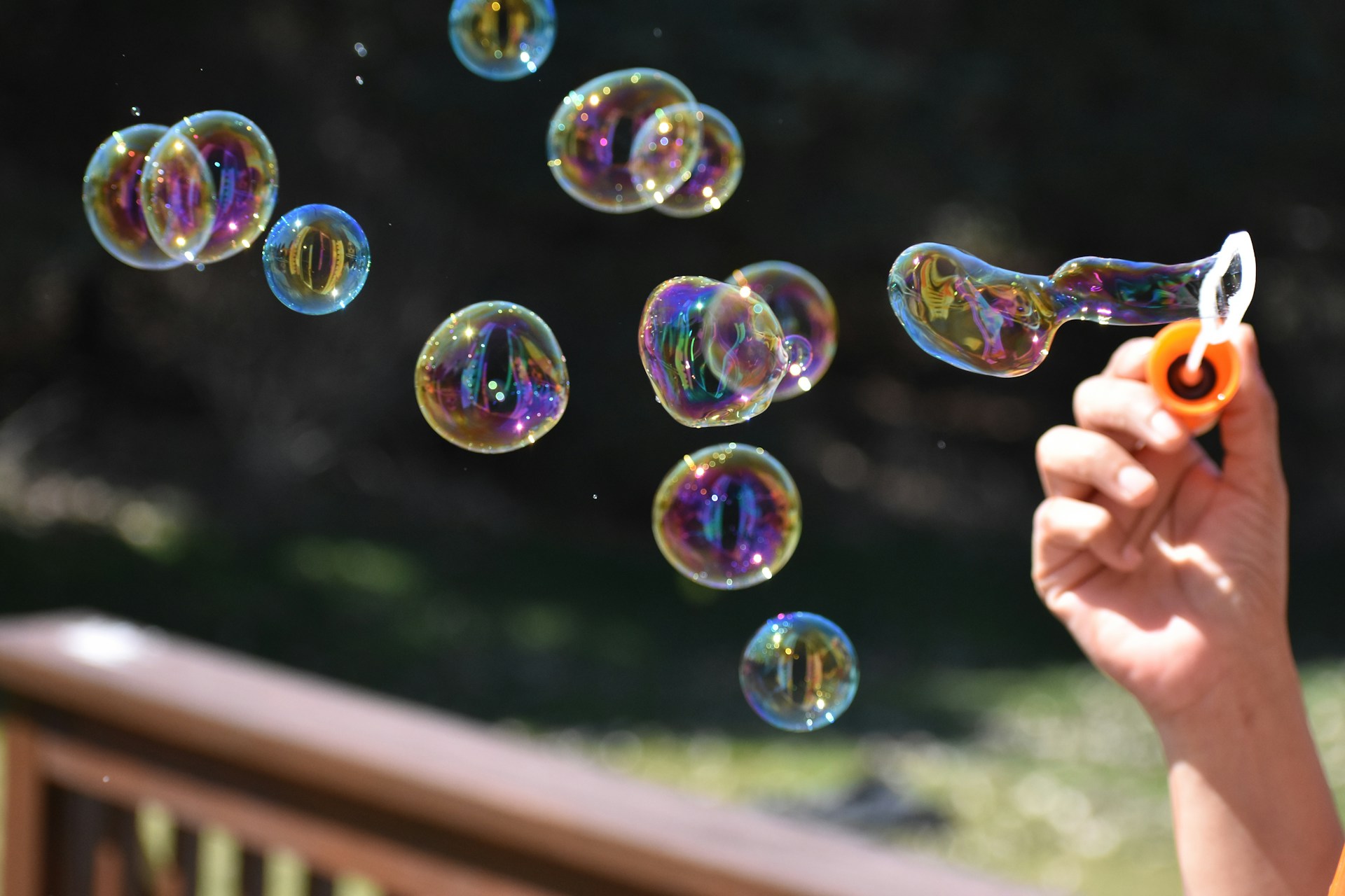 Person blowing bubbles