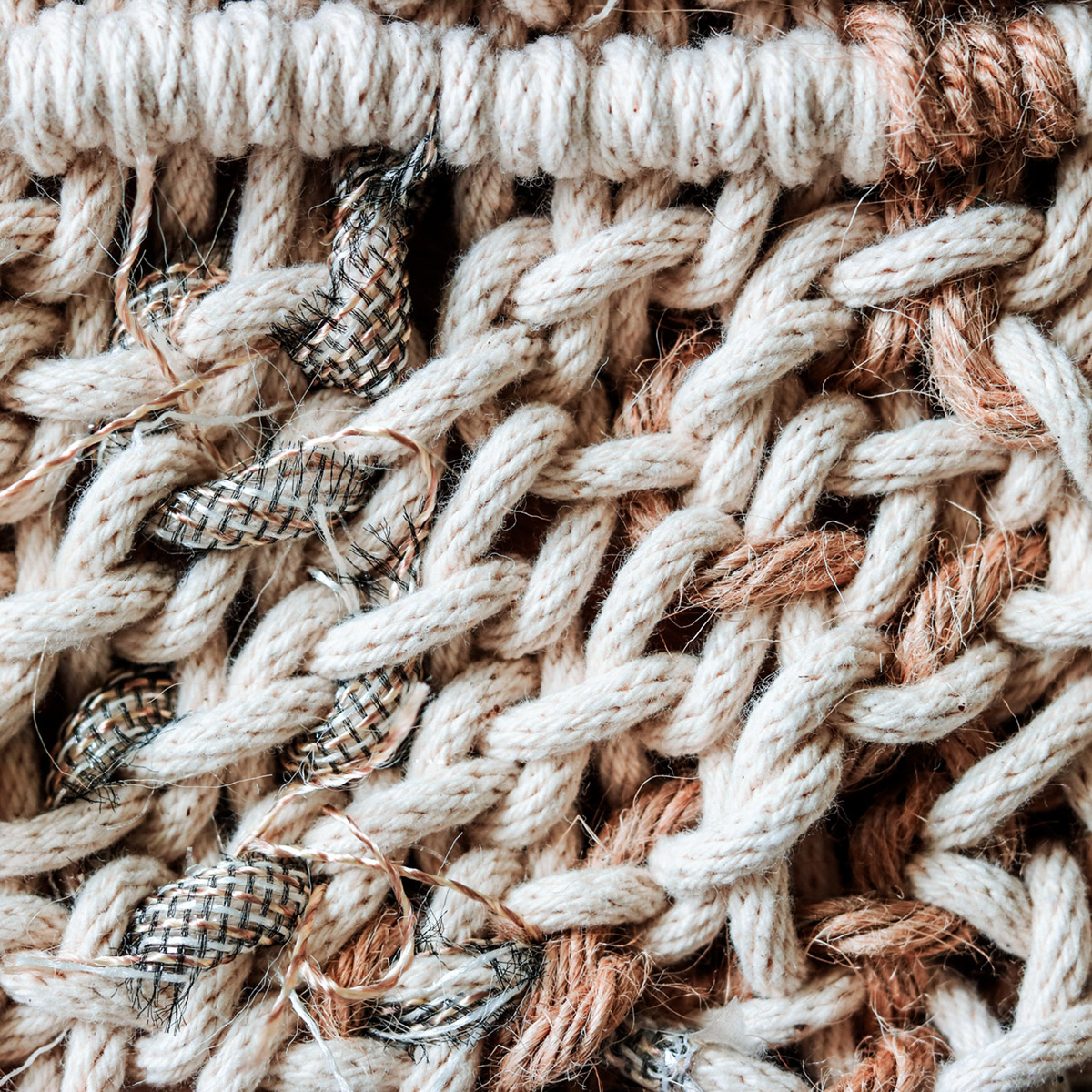 close up of cream and tan woven thread